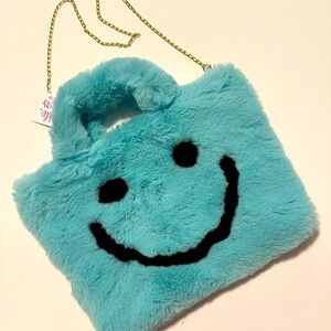 Faux fur purse happy smile aqua green brand new with tag on NEVER USED